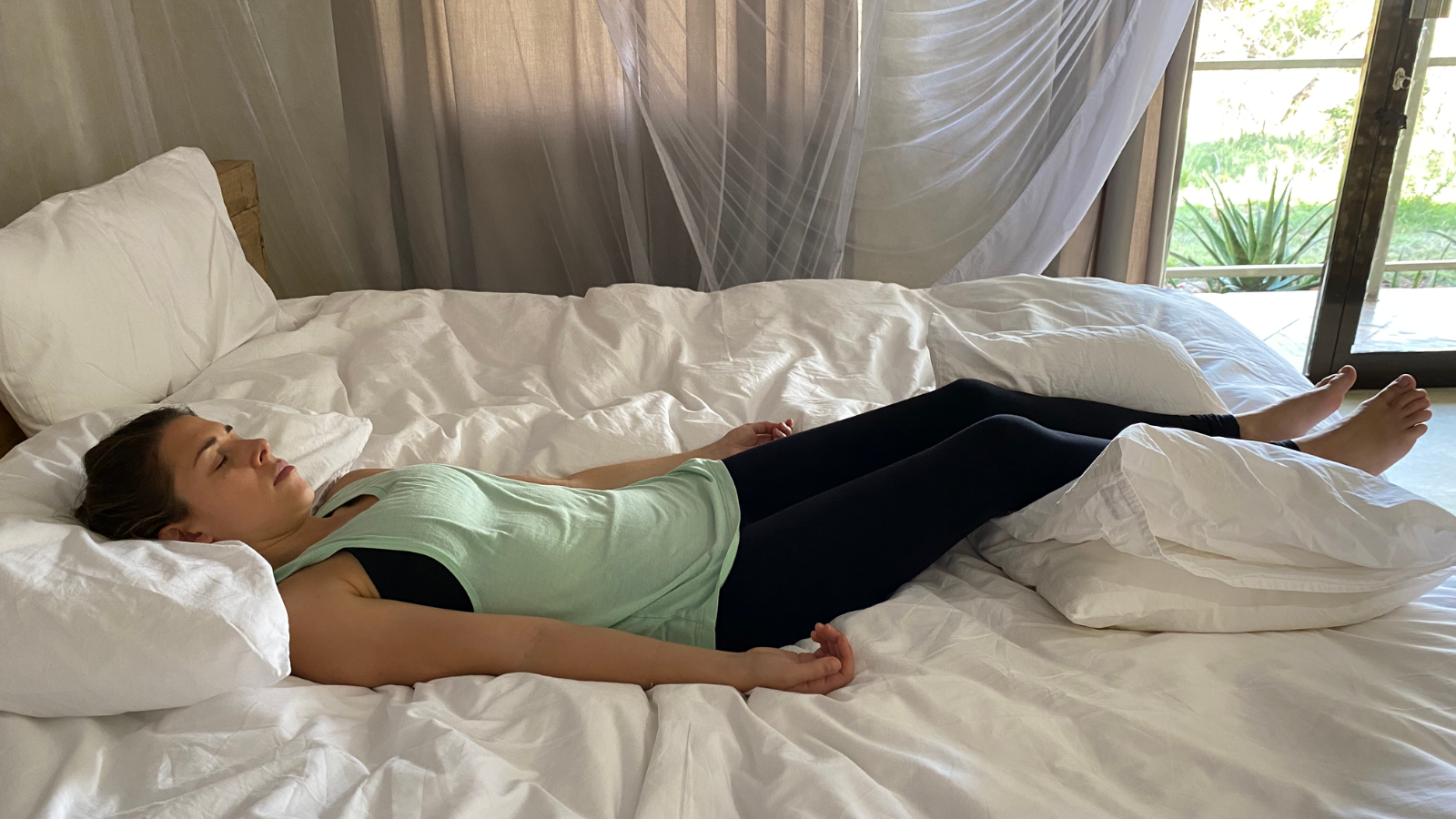 On-your-back restorative yoga pose done right before sleep. Restorative Stonehenge Pose to induce sleep